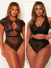 Black lace lingerie set worn by a model on a plain background